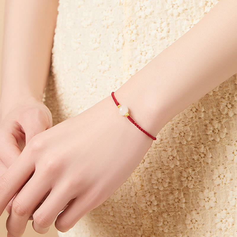 Bracciale intrecciato con perline di giada rotonde fatte a mano con Buddha Stones e portafortuna