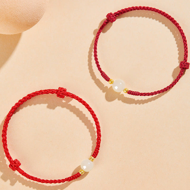 Bracciale intrecciato con perline di giada rotonde fatte a mano con Buddha Stones e portafortuna