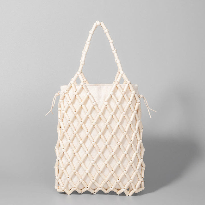 Borsa a mano con perline di legno cave intrecciate a mano in Buddha Stones