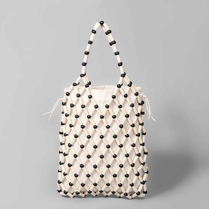 Borsa a mano con perline di legno cave intrecciate a mano in Buddha Stones