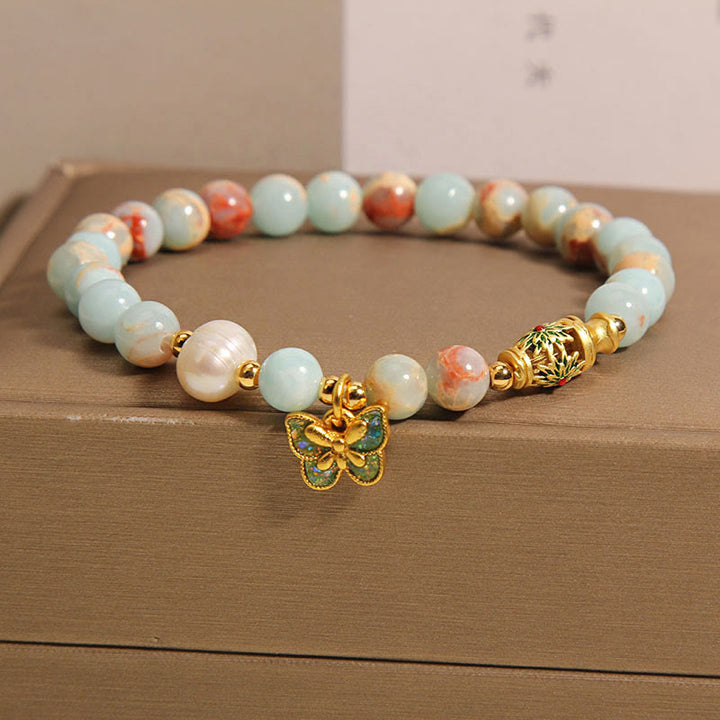 Braccialetto della ricchezza con farfalla di perle di pietra Shoushan Buddha Stones