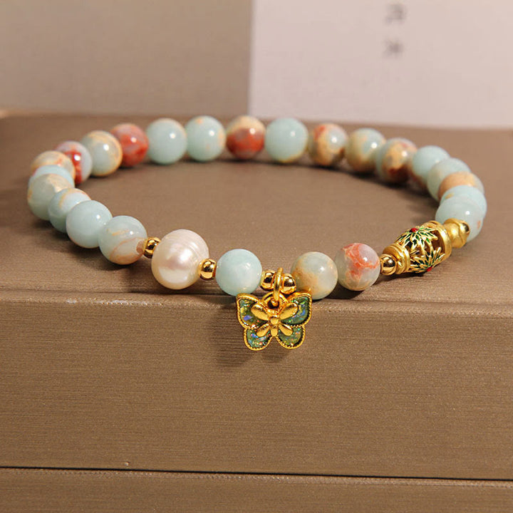 Braccialetto della ricchezza con farfalla di perle di pietra Shoushan Buddha Stones