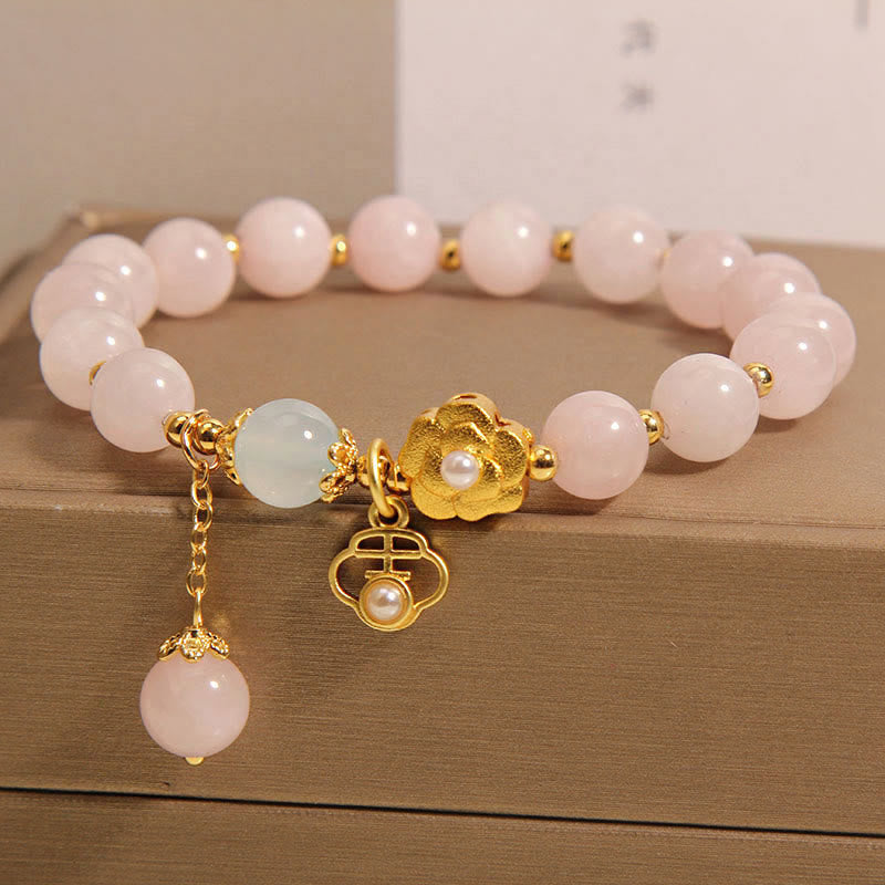 Braccialetto di calore con fiore portafortuna in cristallo rosa naturale Buddha Stones