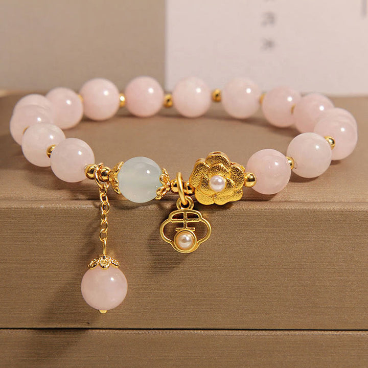Braccialetto di calore con fiore portafortuna in cristallo rosa naturale Buddha Stones