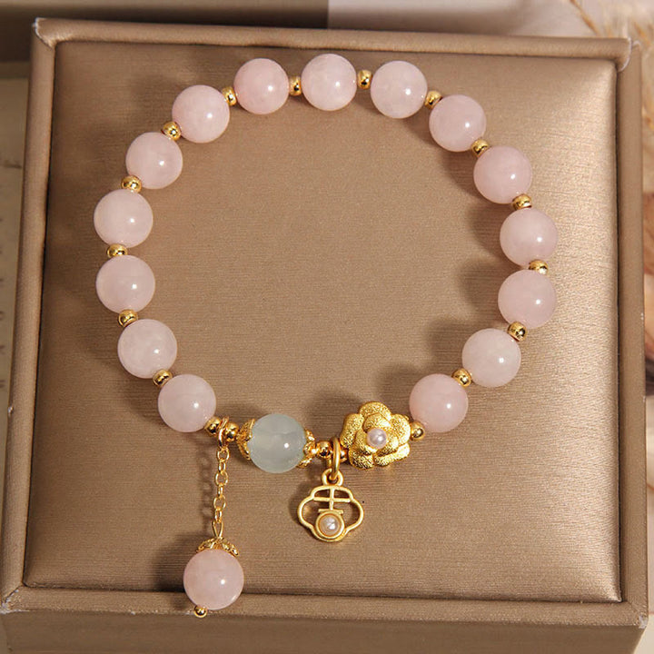 Braccialetto di calore con fiore portafortuna in cristallo rosa naturale Buddha Stones