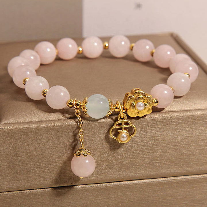 Braccialetto di calore con fiore portafortuna in cristallo rosa naturale Buddha Stones
