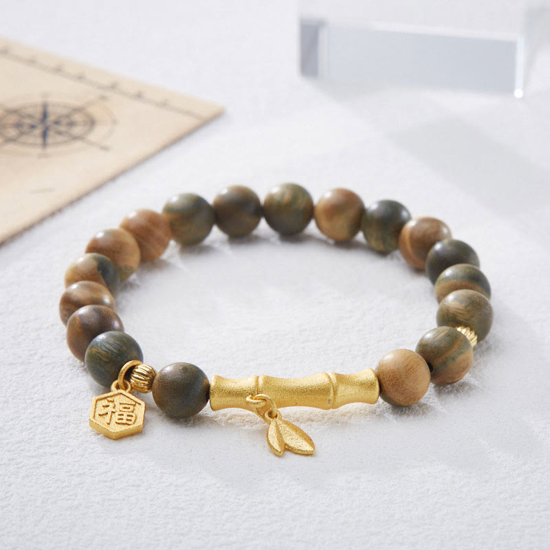Braccialetto rilassante in bambù con carattere Fu in legno di sandalo verde Buddha Stones