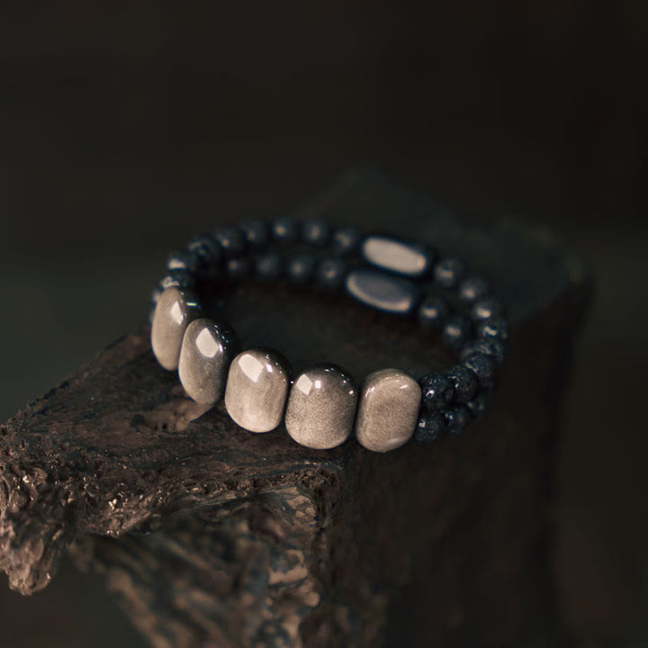 Braccialetto di comunicazione in pietra lavica con ossidiana e argento naturale Buddha Stones