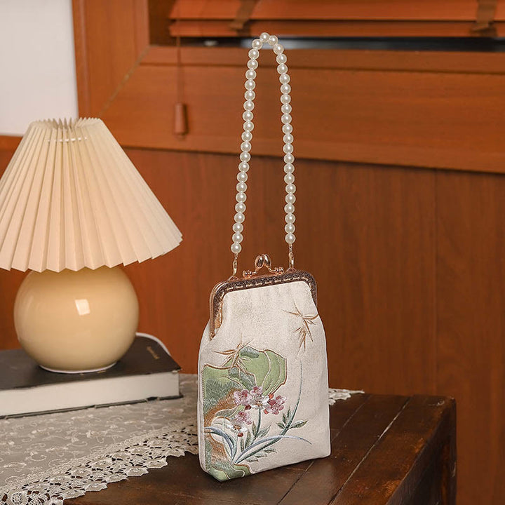 Borsa a tracolla con catena di perle e motivo a orchidea in pietra di montagna Buddha Stones