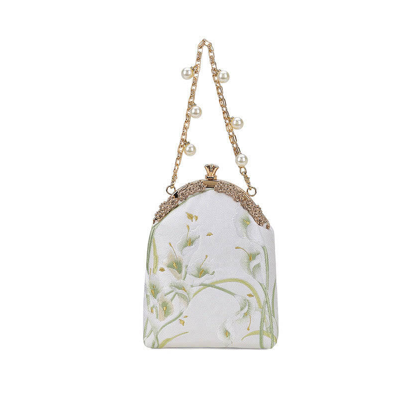 Borsa a tracolla con manico in metallo e ricamo Calla Buddha Stones