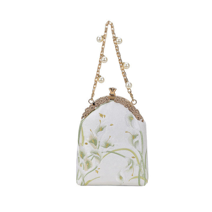Borsa a tracolla con manico in metallo e ricamo Calla Buddha Stones