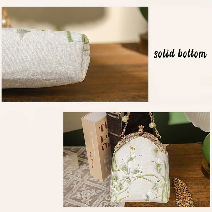 Borsa a tracolla con manico in metallo e ricamo Calla Buddha Stones
