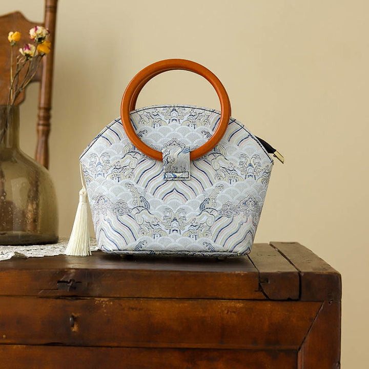 Borsa a mano con stampa a conchiglia di nuvole di buon auspicio Buddha Stones