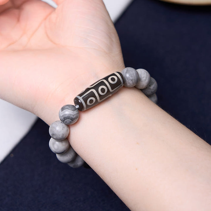 Braccialetto positivo in Buddha Stones Tibetano con nove occhi Dzi Bead Picasso Jasper
