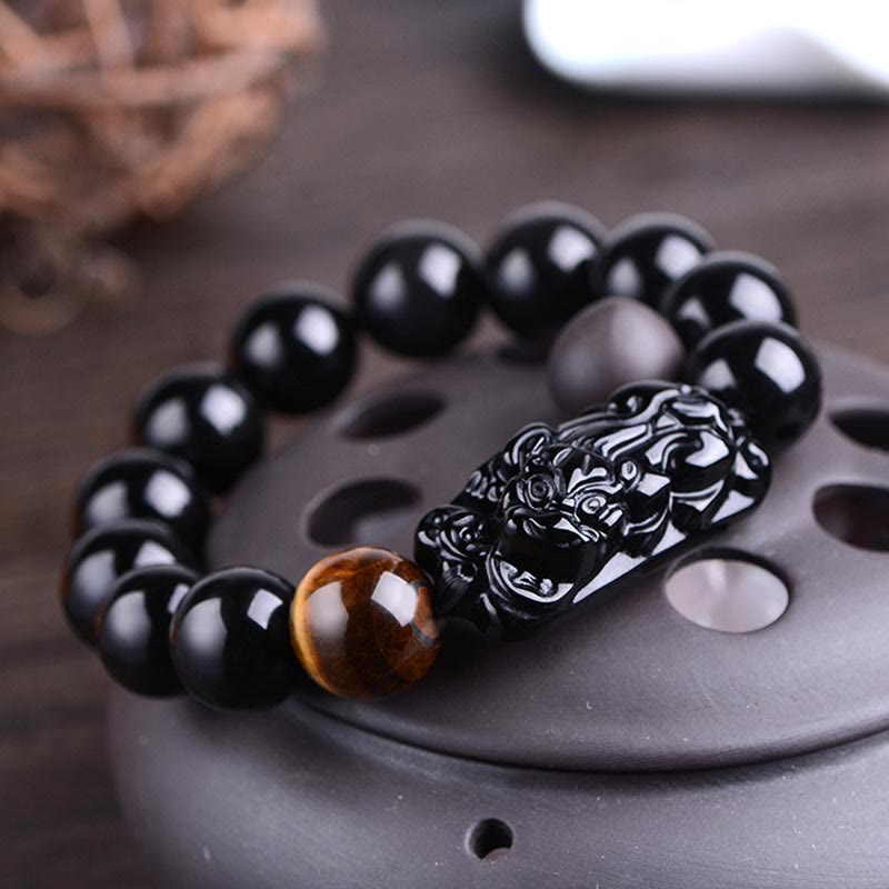Braccialetto Buddha Stones in ossidiana nera naturale PiXiu Tiger's Eye Strength