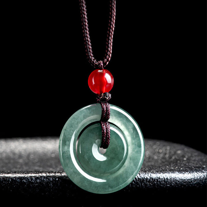 Collana con ciondolo con fibbia della pace doppia in giada verde Buddha Stones Abbondanza
