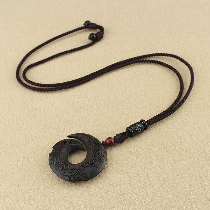 Buddha Stones Legno di ebano Sandalo La fortuna di una persona migliora Modello di design Collana con ciondolo di pace
