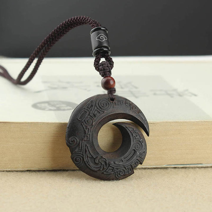 Buddha Stones Legno di ebano Sandalo La fortuna di una persona migliora Modello di design Collana con ciondolo di pace
