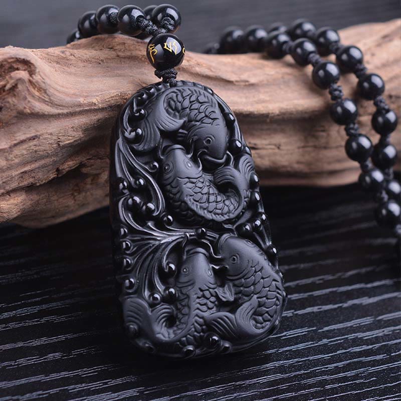 Collana con ciondolo di perline di forza incisa con pesce koi in ossidiana nera Buddha Stones - image 11
