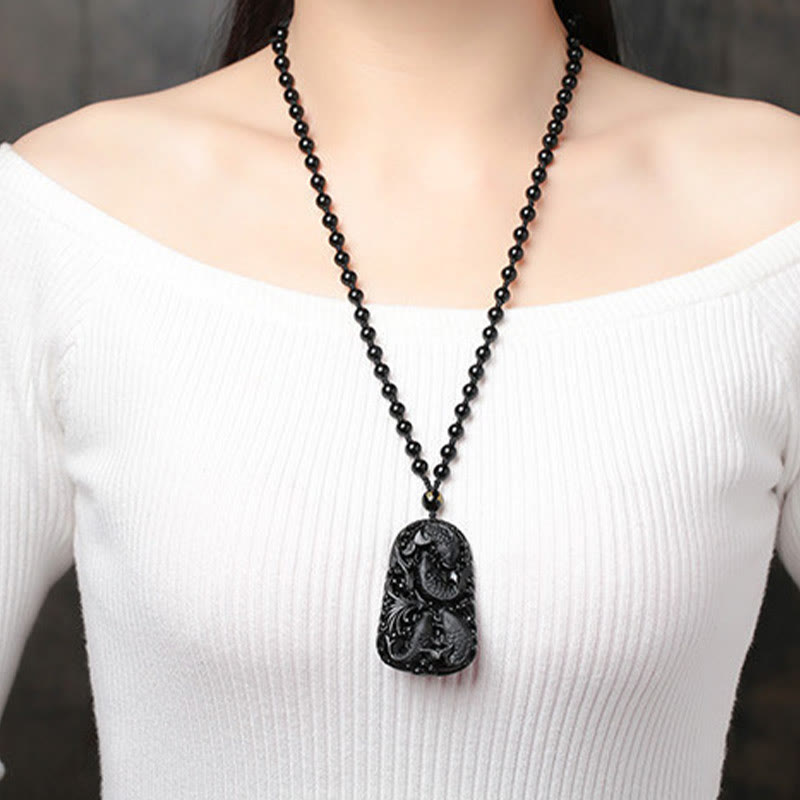 Collana con ciondolo di perline di forza incisa con pesce koi in ossidiana nera Buddha Stones - image 19