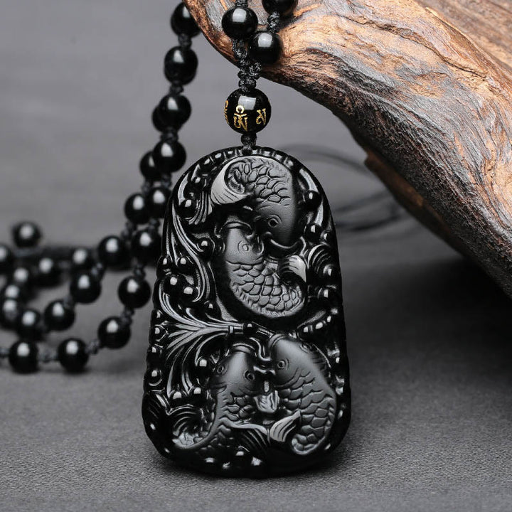 Collana con ciondolo di perline di forza incisa con pesce koi in ossidiana nera Buddha Stones - image 8