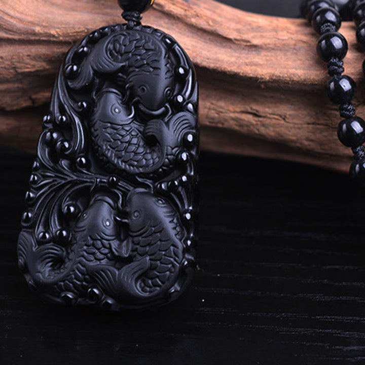 Collana con ciondolo di perline di forza incisa con pesce koi in ossidiana nera Buddha Stones - image 14