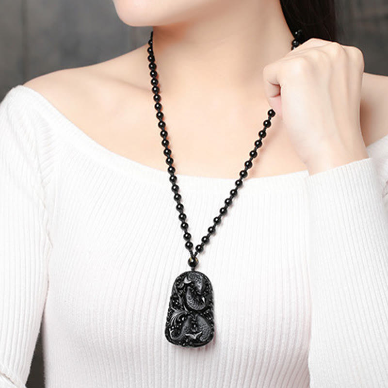 Collana con ciondolo di perline di forza incisa con pesce koi in ossidiana nera Buddha Stones - image 21