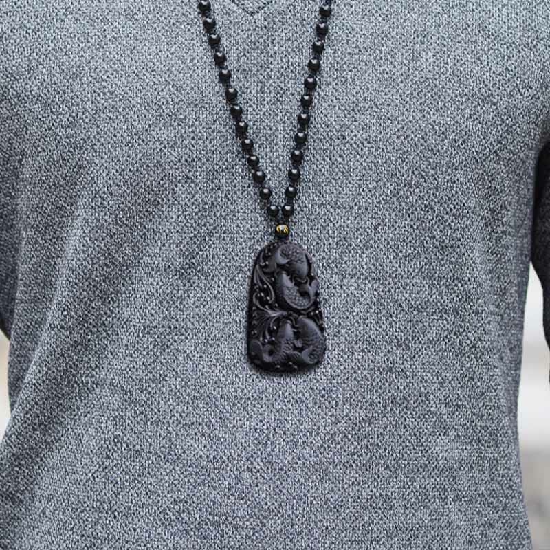 Collana con ciondolo di perline di forza incisa con pesce koi in ossidiana nera Buddha Stones - image 17