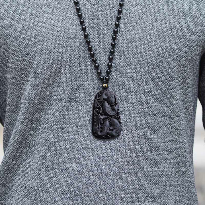 Collana con ciondolo di perline di forza incisa con pesce koi in ossidiana nera Buddha Stones - image 17