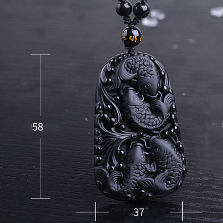 Collana con ciondolo di perline di forza incisa con pesce koi in ossidiana nera Buddha Stones - image 16