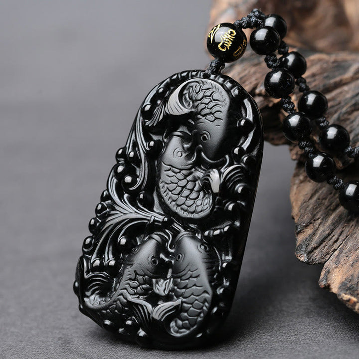 Collana con ciondolo di perline di forza incisa con pesce koi in ossidiana nera Buddha Stones - image 3
