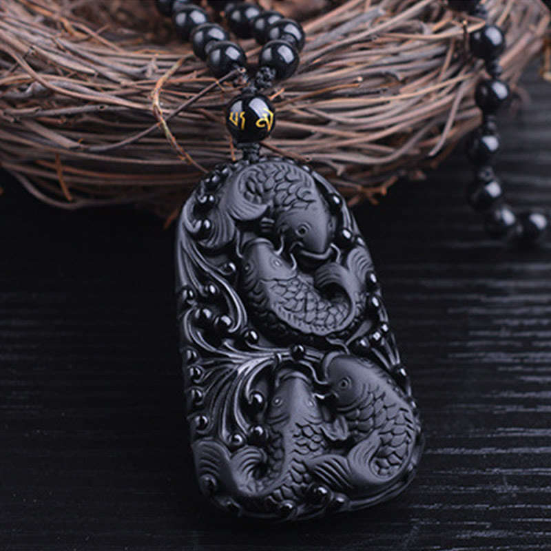 Collana con ciondolo di perline di forza incisa con pesce koi in ossidiana nera Buddha Stones - image 12