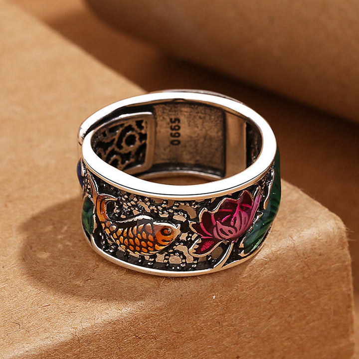 Anello portafortuna con pesce koi Buddha Stones in rame e smalto blu con cuore di loto Sutra