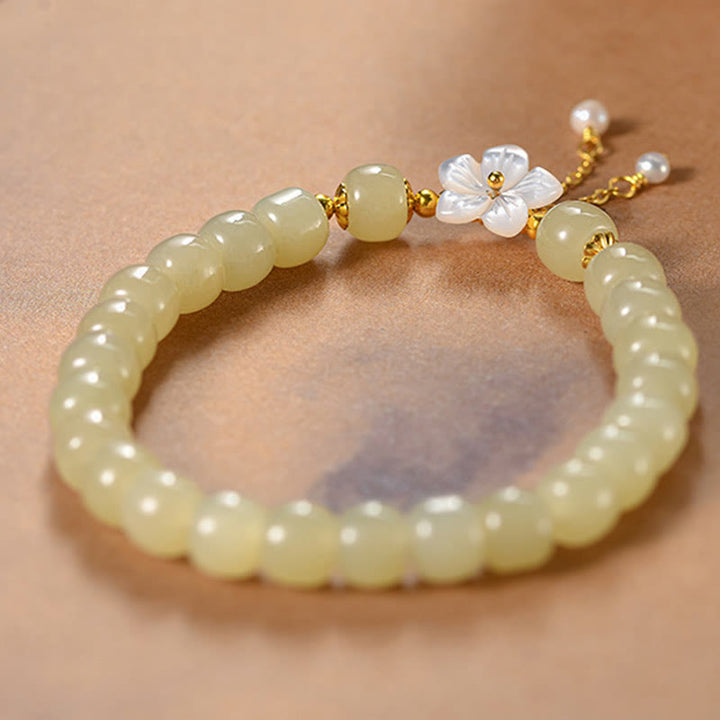 Bracciale Buddha Stones in argento sterling 925 con giada Hetian naturale e fiore della fortuna