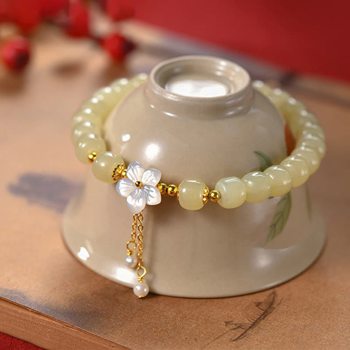 Bracciale Buddha Stones in argento sterling 925 con giada Hetian naturale e fiore della fortuna