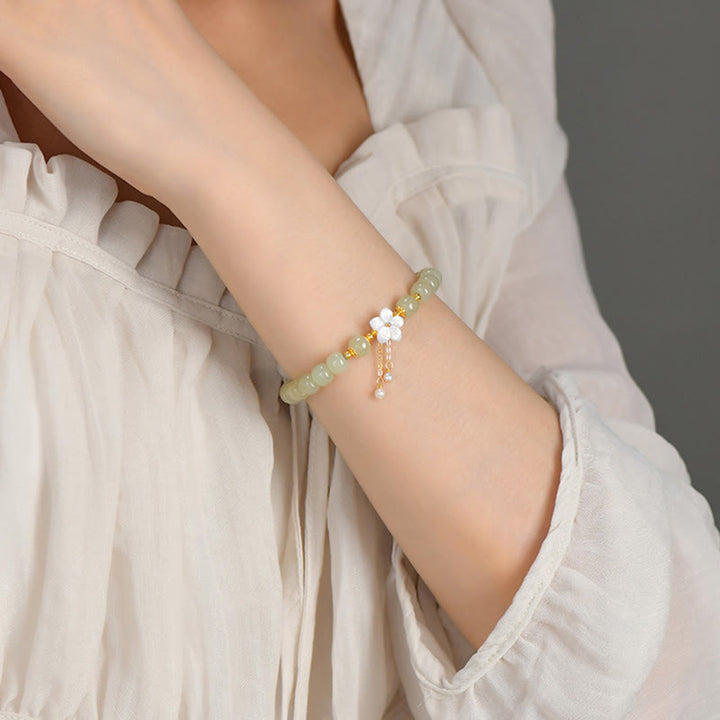 Bracciale Buddha Stones in argento sterling 925 con giada Hetian naturale e fiore della fortuna