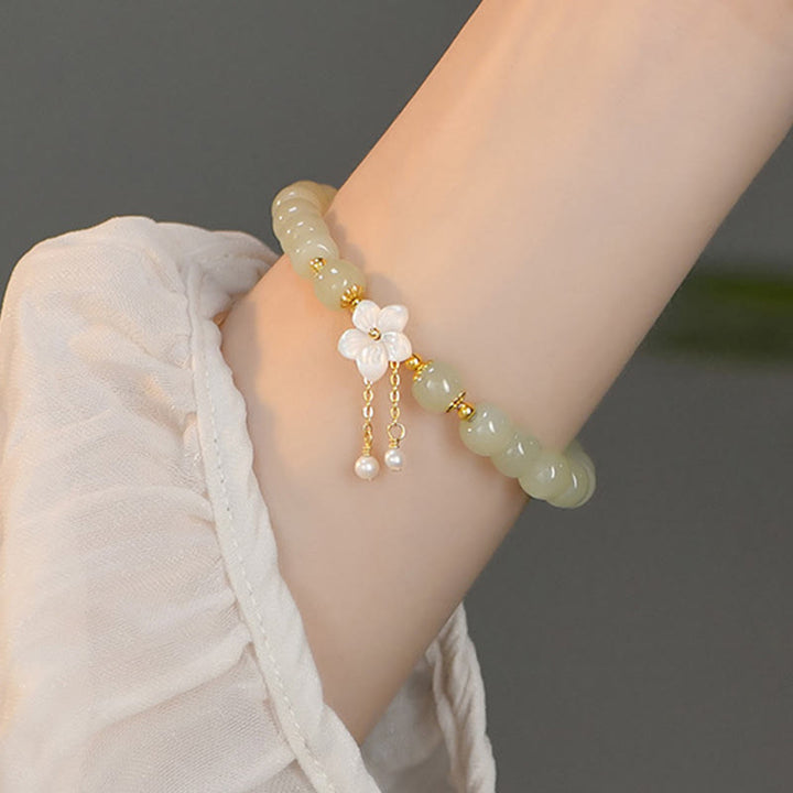Bracciale Buddha Stones in argento sterling 925 con giada Hetian naturale e fiore della fortuna