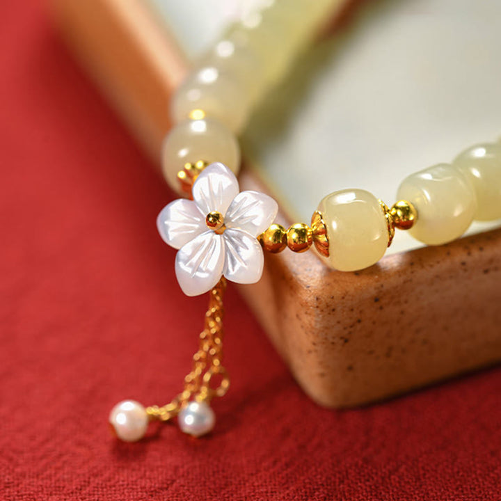 Bracciale Buddha Stones in argento sterling 925 con giada Hetian naturale e fiore della fortuna