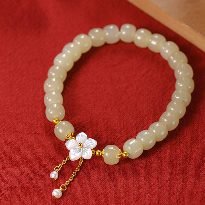 Bracciale Buddha Stones in argento sterling 925 con giada Hetian naturale e fiore della fortuna