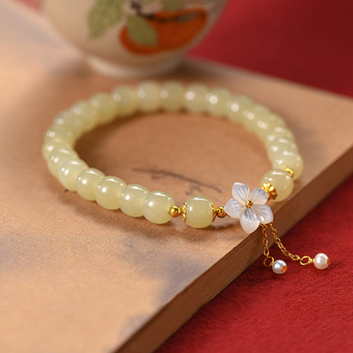 Bracciale Buddha Stones in argento sterling 925 con giada Hetian naturale e fiore della fortuna