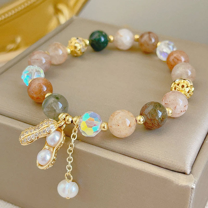 Braccialetto con ciondolo a forma di arachide con quarzo rutilato colorato e pietre del sole Buddha Stones
