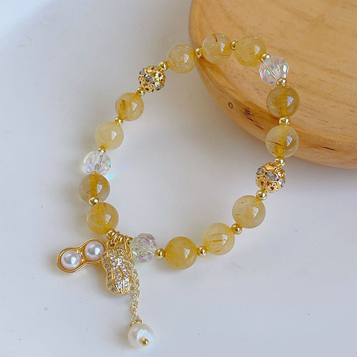 Braccialetto con ciondolo a forma di arachide con quarzo rutilato colorato e pietre del sole Buddha Stones