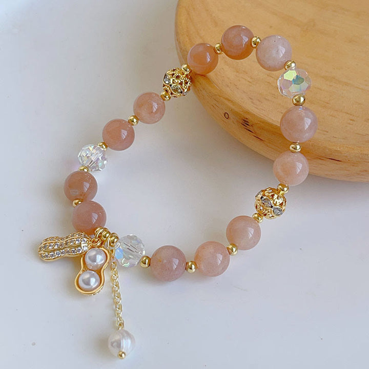 Braccialetto con ciondolo a forma di arachide con quarzo rutilato colorato e pietre del sole Buddha Stones