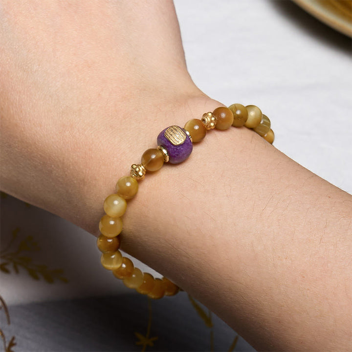 Braccialetto di protezione della fortuna con perline di occhio di tigre e Buddha Stones