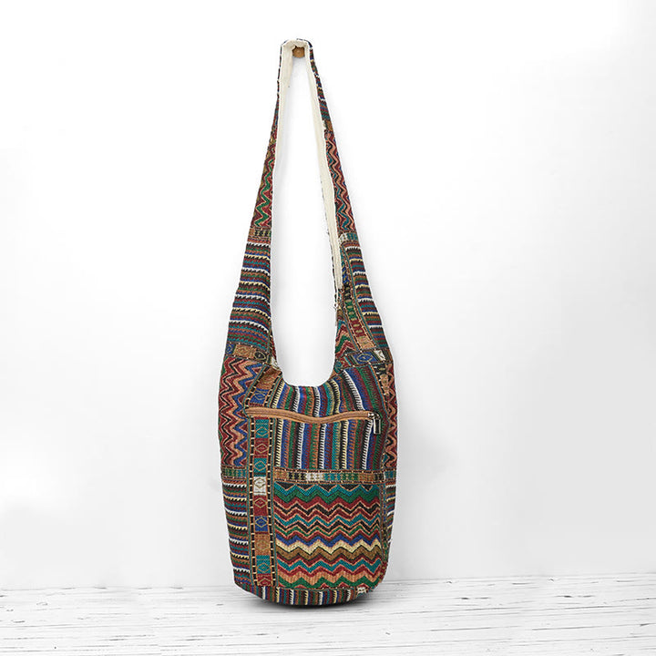 Borsa a tracolla in cotone con motivo a onde marroni e verdi Buddha Stones