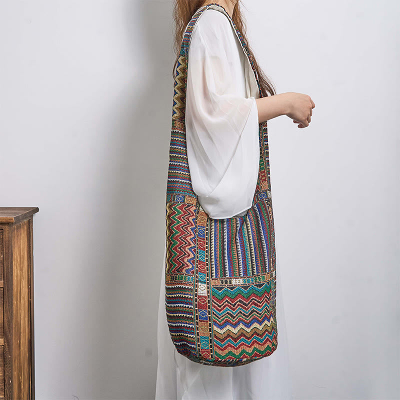 Borsa a tracolla in cotone con motivo a onde marroni e verdi Buddha Stones