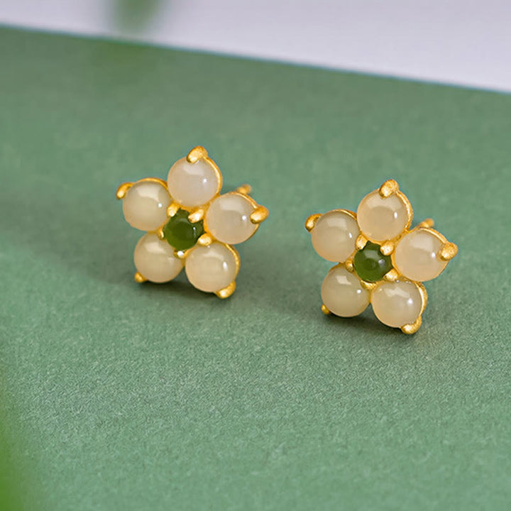 Orecchini a bottone con fiore della fortuna in giada Hetian in argento sterling 925 Buddha Stones