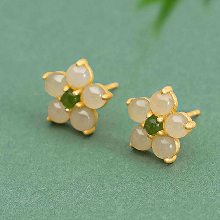 Orecchini a bottone con fiore della fortuna in giada Hetian in argento sterling 925 Buddha Stones