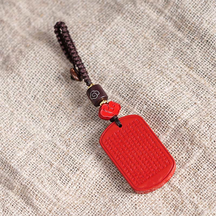 Portachiavi con benedizione del Sutra del cuore in cinabro naturale Buddha Stones