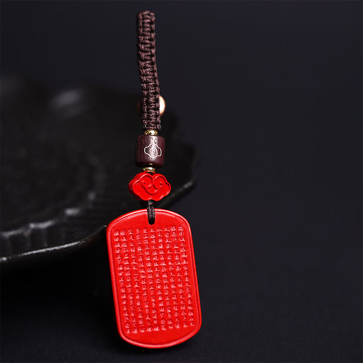 Portachiavi con benedizione del Sutra del cuore in cinabro naturale Buddha Stones